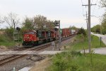 Q116 rolls east as it splits the tri-light signals at mile 47